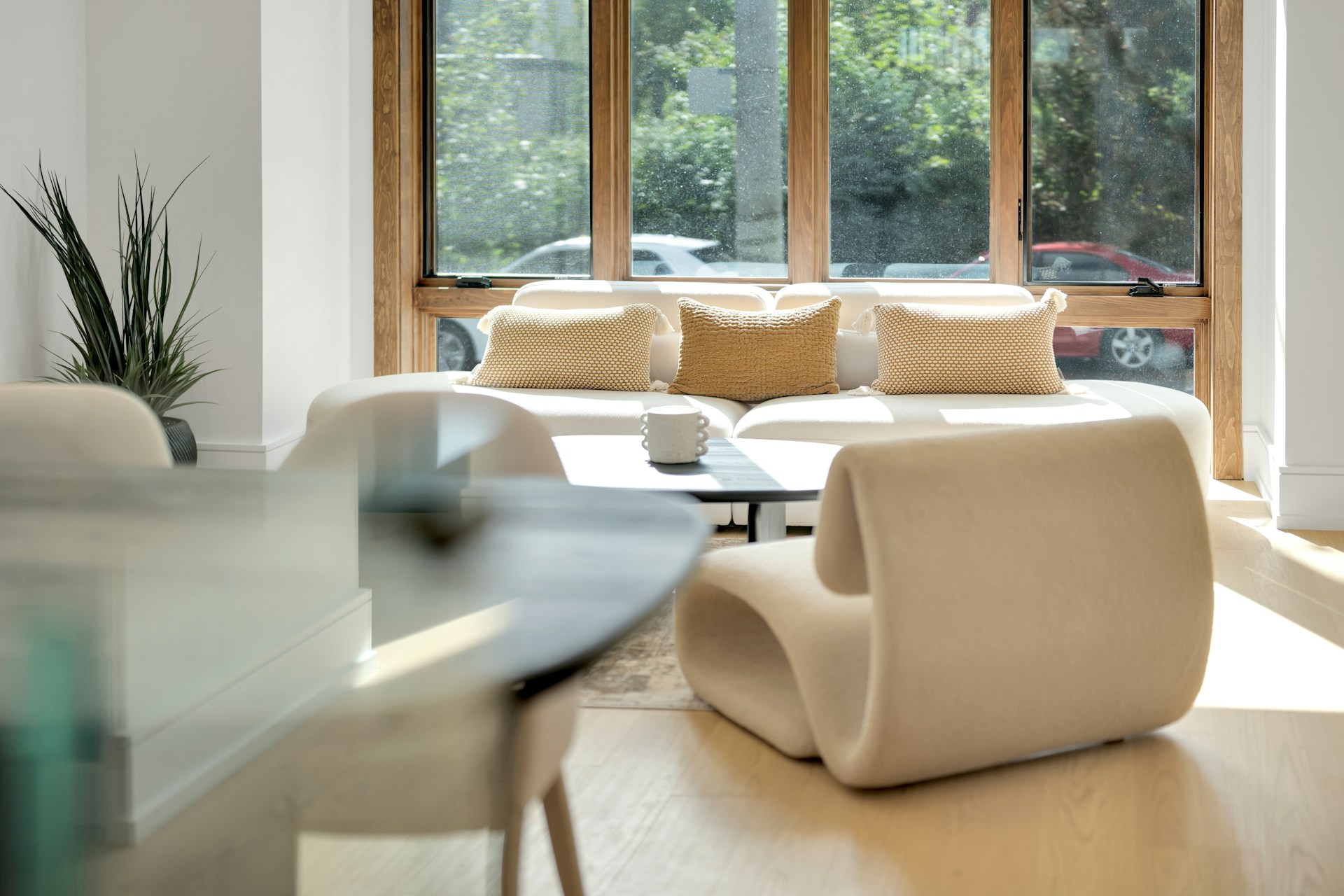 Minimalist Home Styling: Less Is More Modern living room with stylish furniture and large window